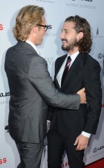 Guy Pearce tickles Shia LaBeouf during the Lawless LA premiere.jpg