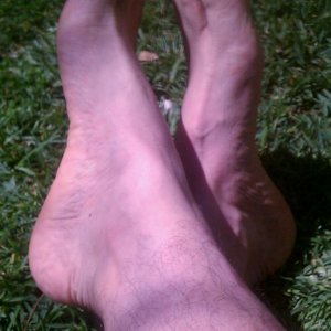 Ticklish Bare feet in the grass