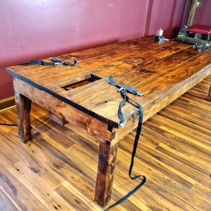 New wooden bondage table.