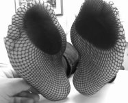 mary_s_feet_in_fishnets_in_b_w_03_by_osco89-d7flb6n.jpg