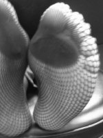 mary_s_feet_in_fishnets_in_b_w_05_by_osco89-d7flsad.jpg