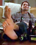 Kristoffer Polaha soles on table.jpg