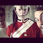 Francois Arnaud tickling London guard.jpg