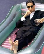 Michael Easton soles floating in pool.jpg