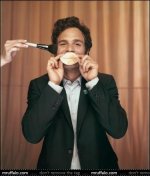 Mark Ruffalo tickled with a brush during a photoshoot.jpg
