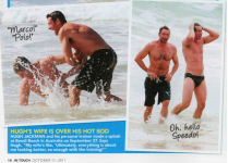 Hugh Jackman tickled by his trainer.png