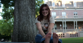 Lina, Bare Foot on a Bench.png