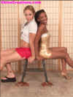 Amber in golden dress with Maliyah siting (blurry).png