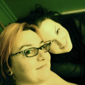 one of my partners and me snuggling after tickles <3