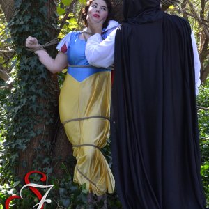 The Evil Huntsman was ordered by the Evil Queen to tie me to a tree and be left for her, but the Evil Huntsman might just take Snow White for his own.