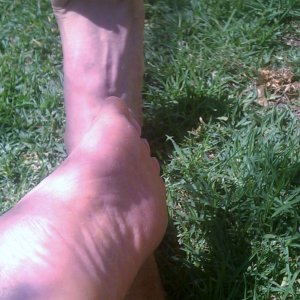 Ticklish Bare feet in the grass