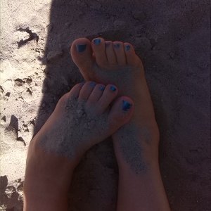 Playing with my feet in the sand