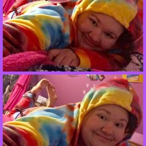 My tye dye onesie is finally here and I feel like a comfy cozy snow bunny!!! :) with cute exposed ticklish feet! :P