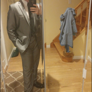 Me in a suit. Please excuse the mess in the background. I took the picture by the entrance closet. I was about to leave for work.