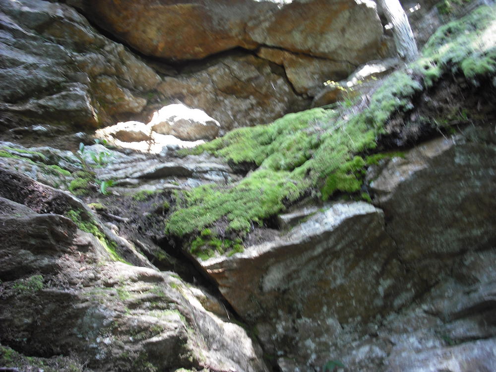 A partial view of the Devil's Oven in Devil's Hopyard. A very steep rock formation.