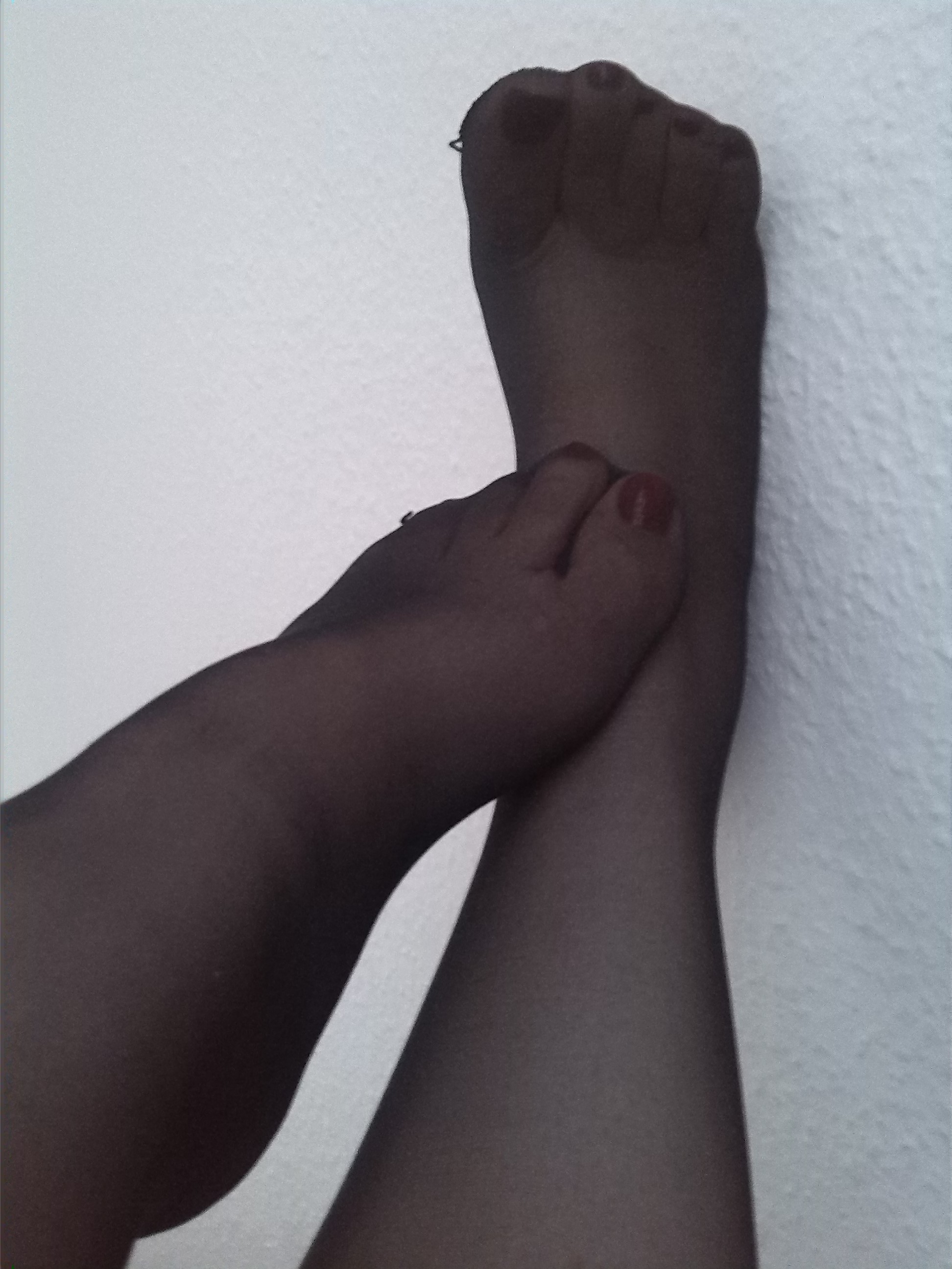 Feet in black nylon