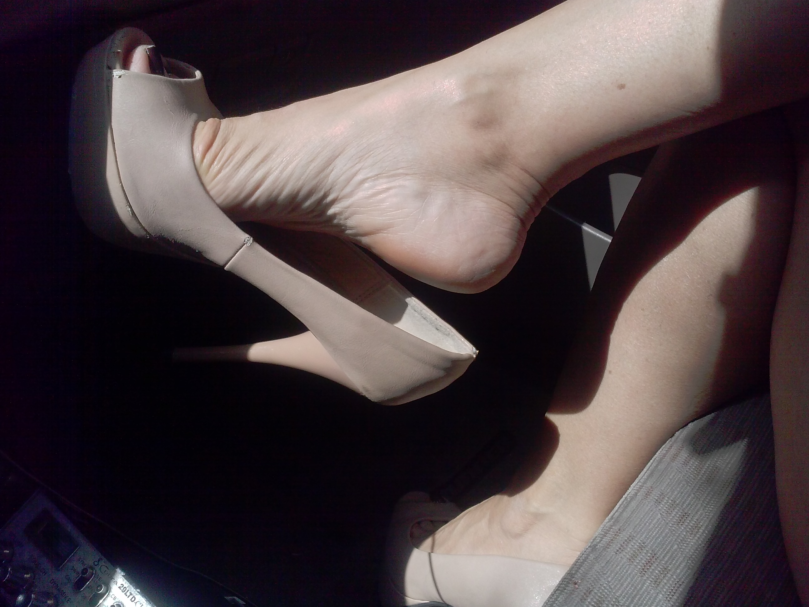 Hot wife dangling her heel to tease..