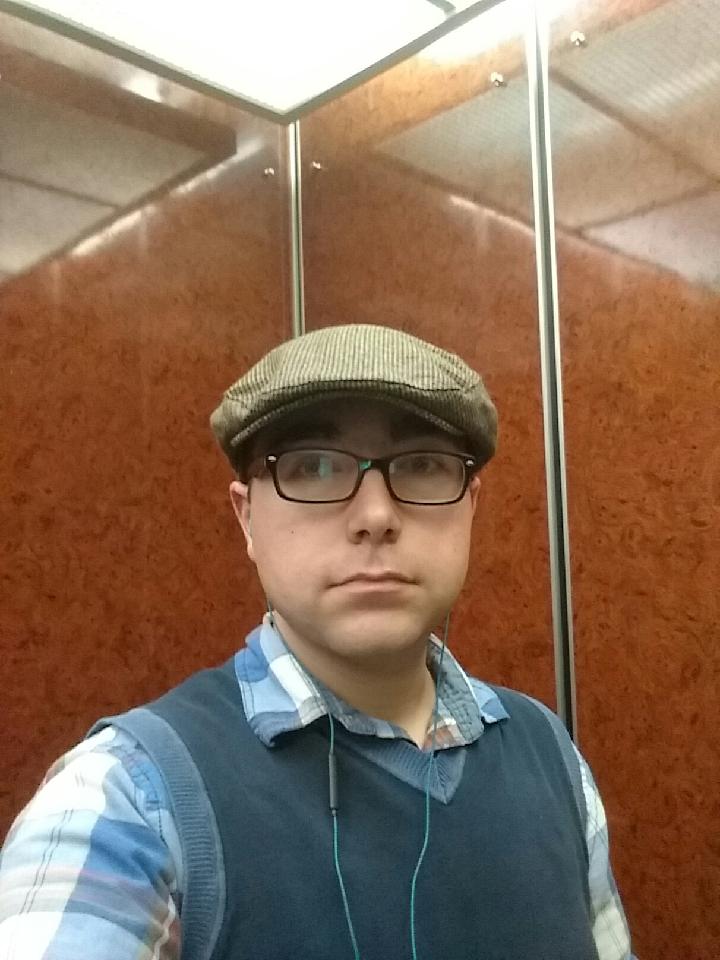 I took this when I was doing loss prevention at Macy's. I was doing a walk of the store and always wanted to try on that hat. I think it looks good.