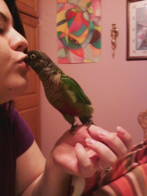 Me and my bird, she's a green cheek conure, her name is Kira.