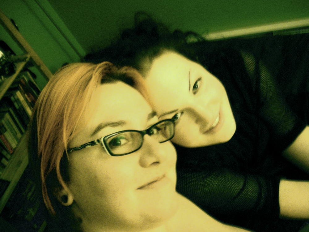 one of my partners and me snuggling after tickles <3