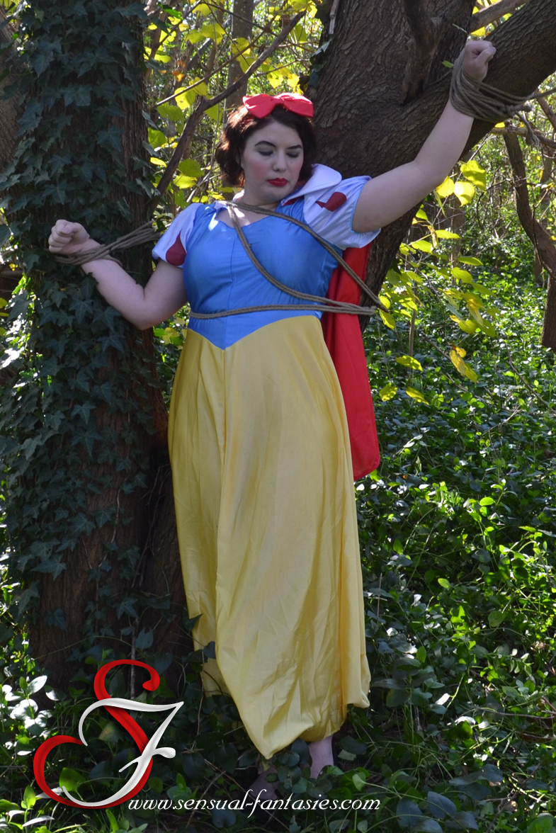 Snow White tied to a tree by the Evil Huntsman. Please be sure to check out the site in the watermark.