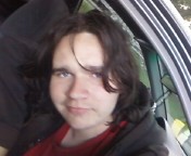 Taken at a campsite... when i had freakin Long Hair!