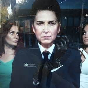 This character is called "The Governor" Joan Ferguson. From a prison drama called Wentworth. (Currently on Netflix.) (And btw I LOVE black gloves... c