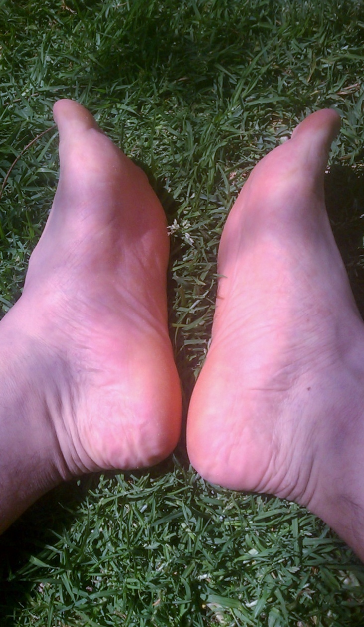 Ticklish Bare feet in the grass