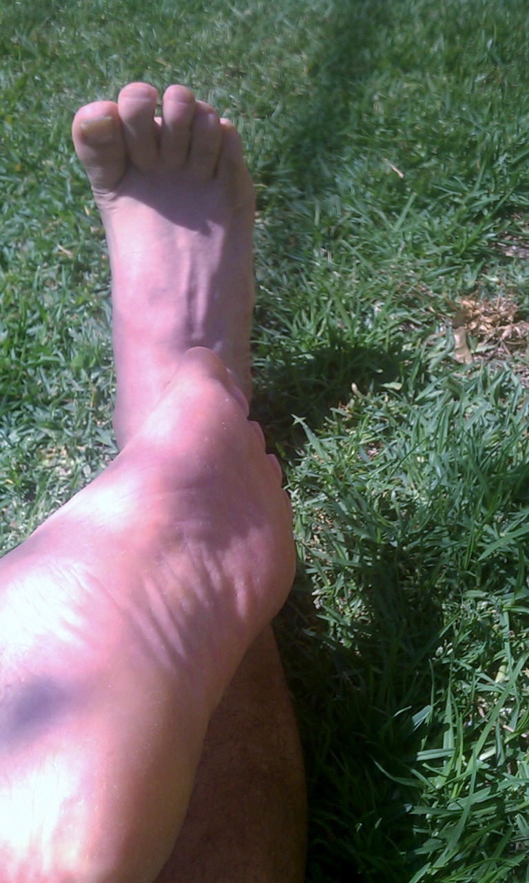 Ticklish Bare feet in the grass