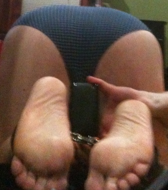 Two naked feet + chained together = playtime!