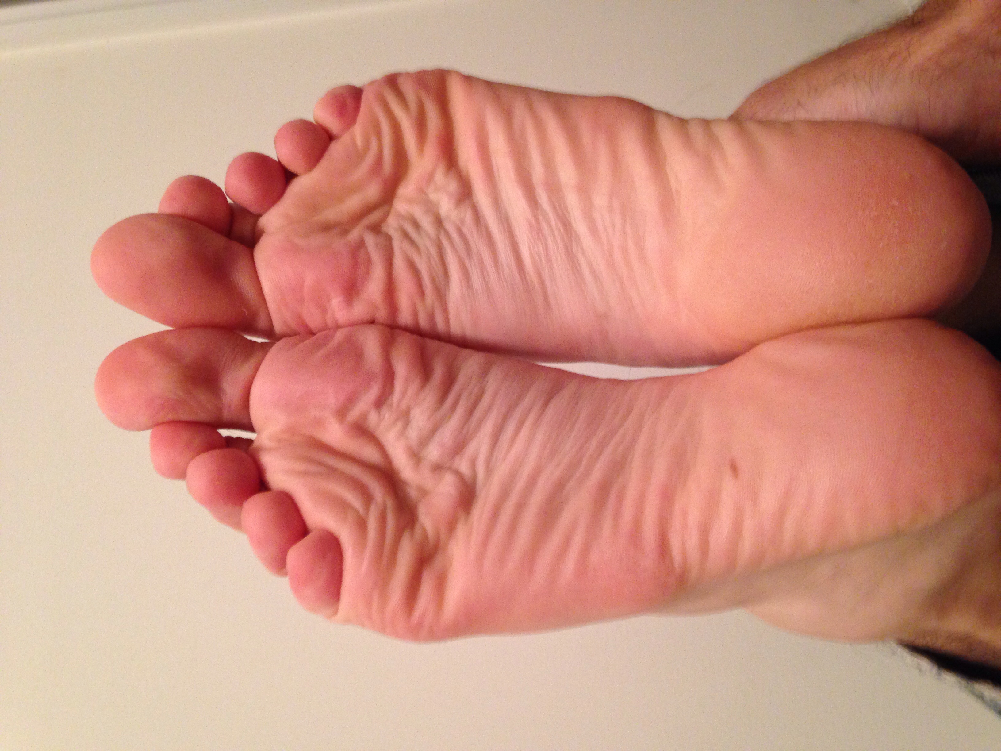 Wrinkled ticklish feet