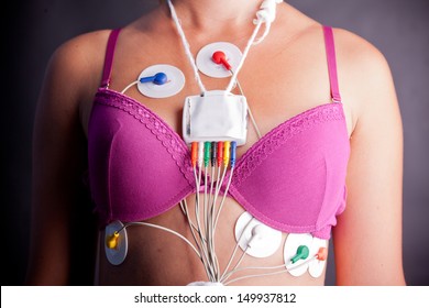 young-woman-wearing-holter-heart-260nw-149937812.jpg